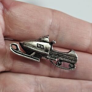The Mountain Stuff Mark Eliot Schwabe Snowmobile Pin Silver Tone